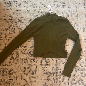 Green garage turtleneck